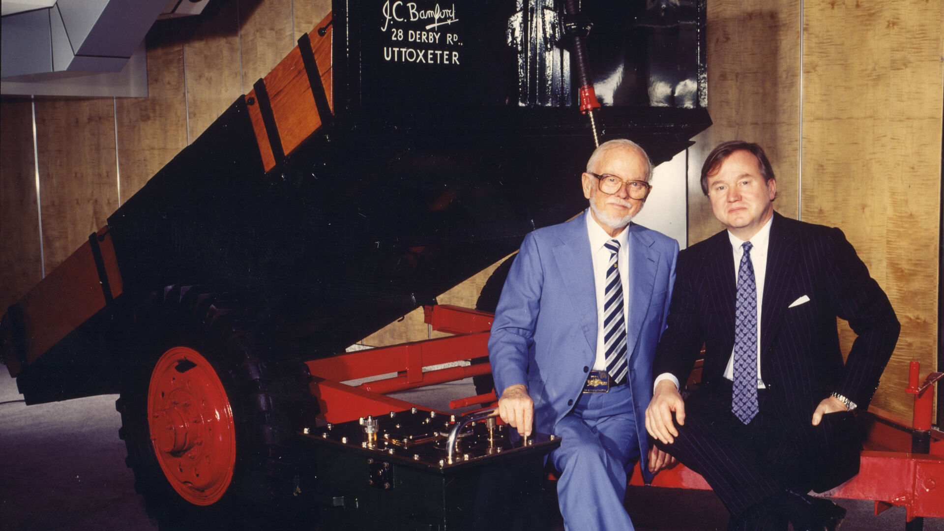 Mr JCB and Lord Bamford on Trailer in reception