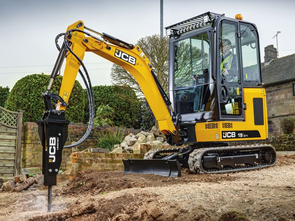 19c-1 cabbed mini excavator with HM012T breaker attachment